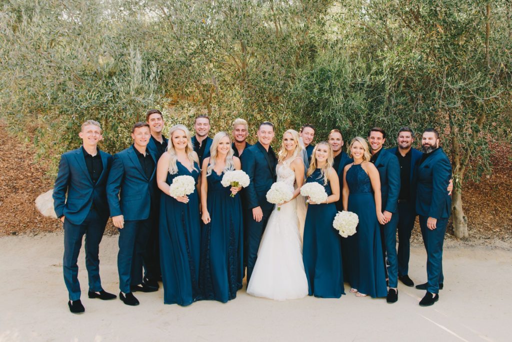 group portrait of wedding party at a Terra Mia Fall Wedding