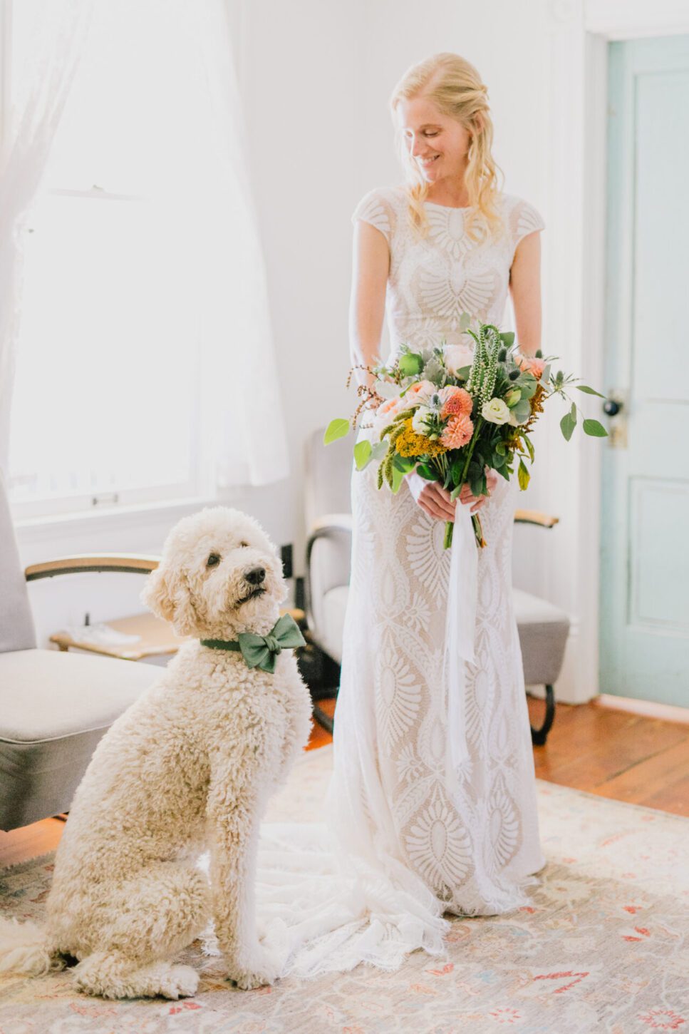A bride with her dog at a Flying Caballos Wedding
