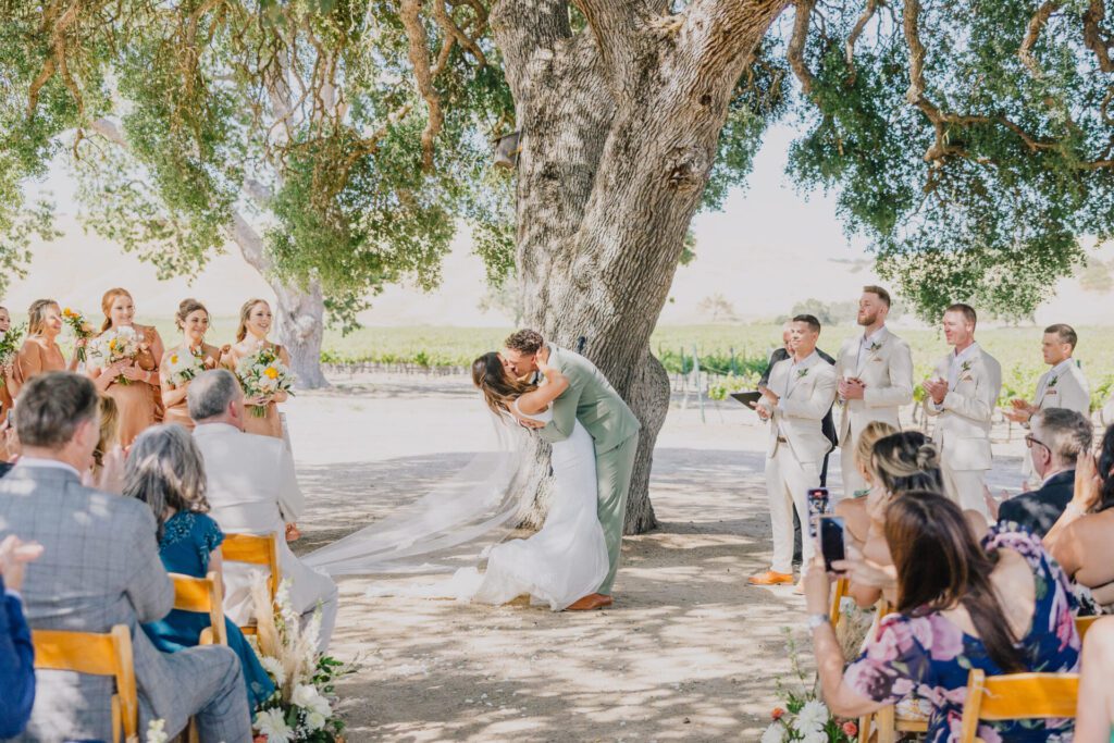 Epic first kiss after a Cass Winery Ceremony underneath the Oak Tree