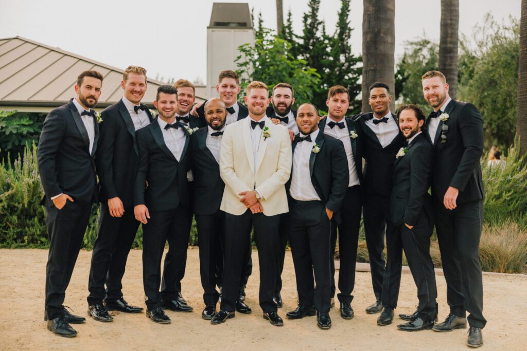 Groom and Groomsman at a Biddle Ranch Vineyards Wedding by Jake and Necia Photography